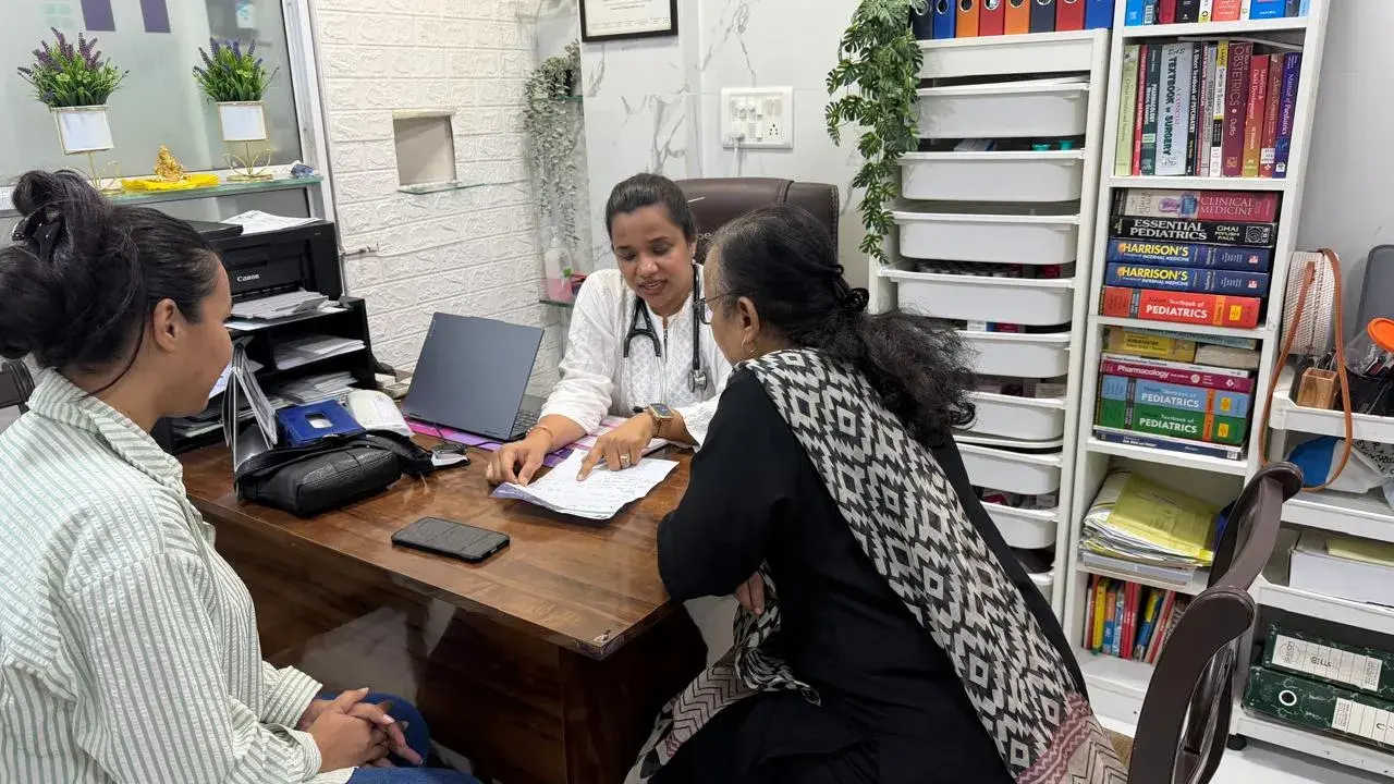 Dr. Kiran explaining to patients